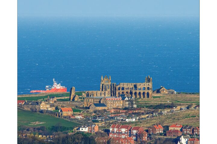 The Trafalgar Sentinel passing Whitby Abbey